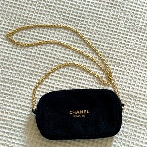 Chanel Black and Gold Women's makeup bag